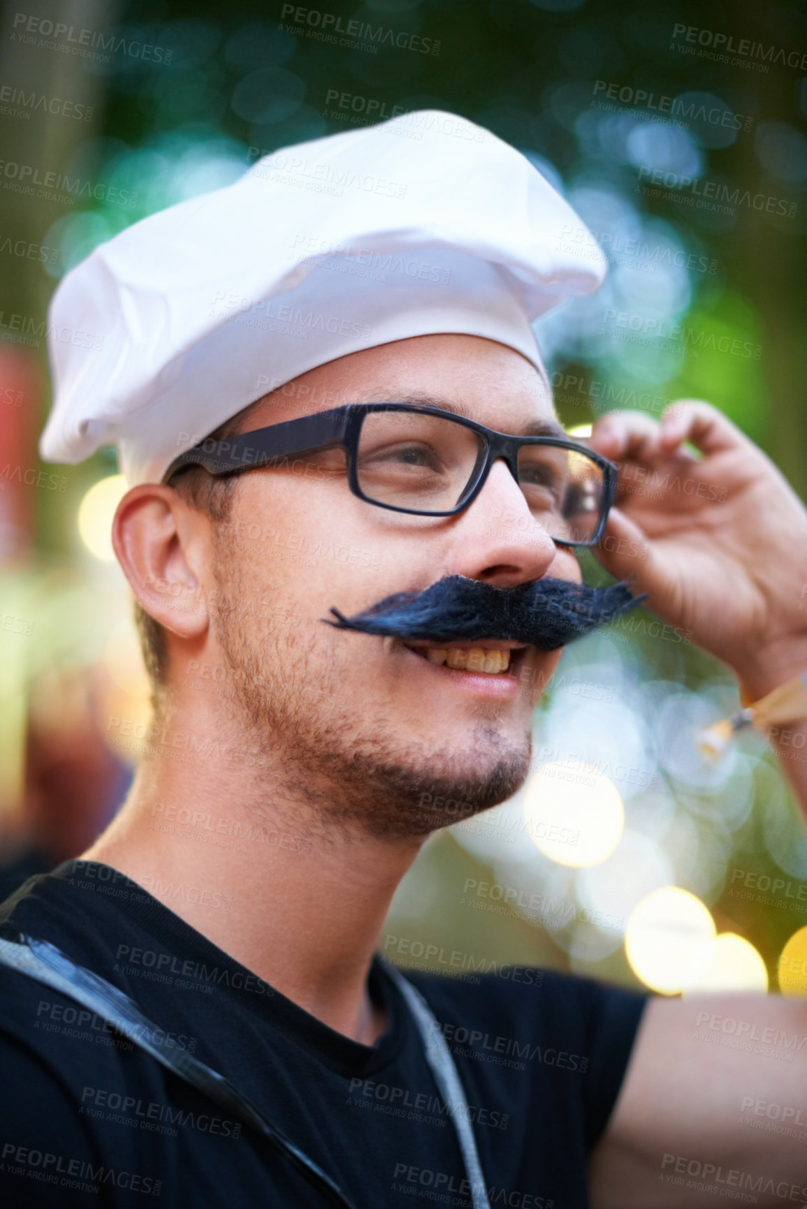 Buy stock photo Man, fake moustache and smile at carnival with costume for entertainment, celebration and party in France. Outdoor event, festival and fun for summer holiday to relax, music and enjoy vacation. 