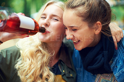 Buy stock photo Portrait, concert and women with a bottle of wine, hug and smile with happiness or bonding together. Funny, people or outdoor with friends or alcohol with weekend break or excited with music festival