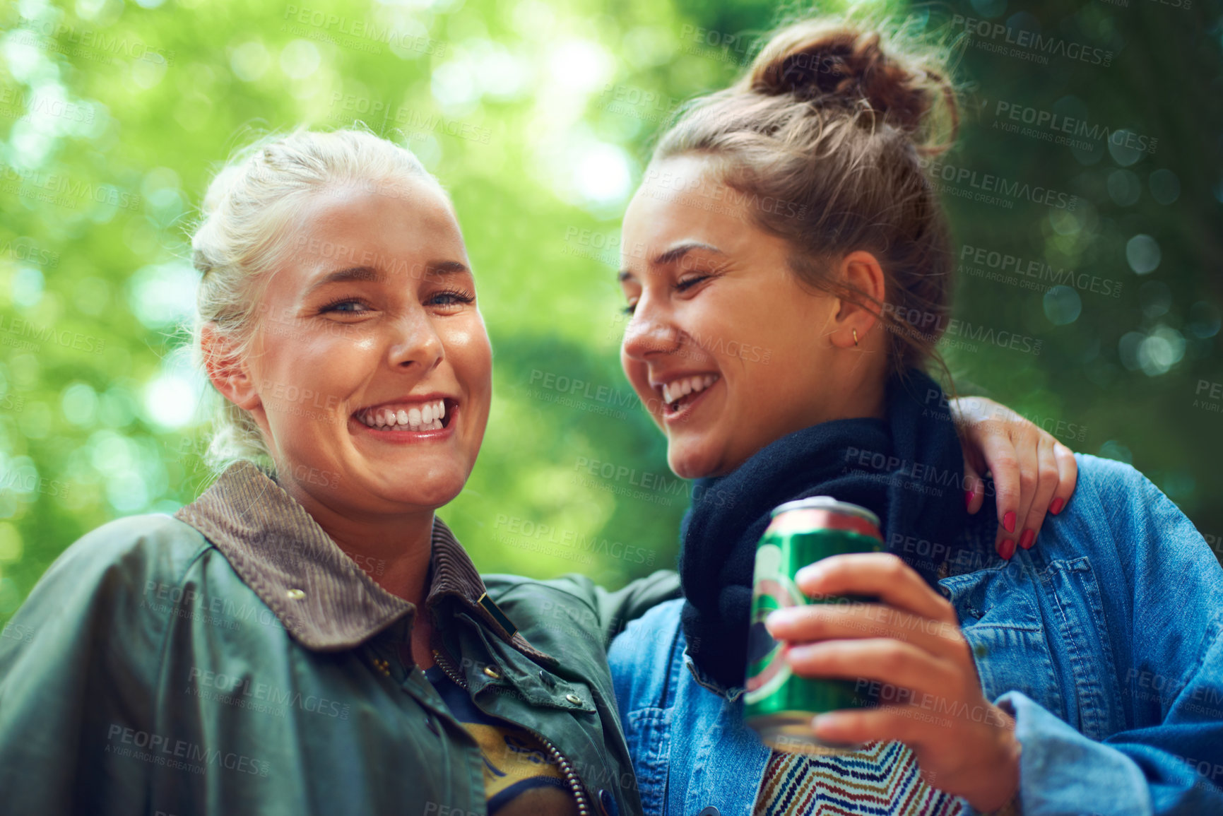 Buy stock photo Portrait, music festival and women with a beer, hug and excited with happiness and bonding together. Face, people or outdoor with friends and alcohol with weekend break and smile with embrace and can