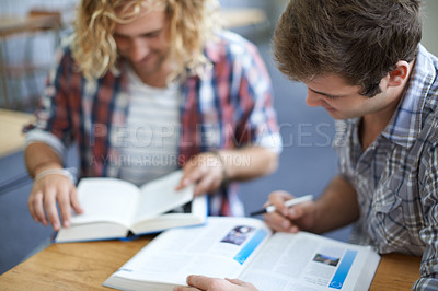 Buy stock photo Men, students and reading from textbook in university classroom for group work, education or research. Male people, friends and college lecture for test information or together, knowledge or learning