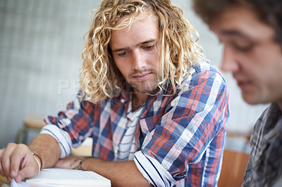 Buy stock photo Students, reading and textbook in university lecture or teamwork for assignment, project or research. Male people, friends and group studying in college for education or class learning, notes or exam