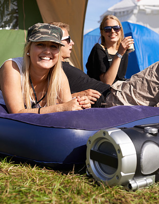 Buy stock photo Women, relax and mattress at outdoor festival with happiness, camping or sunshine on grass. Friends, portrait and freedom with smile, support and summer vacation on camp, event or adventure in nature