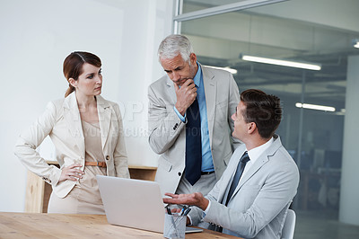 Buy stock photo Laptop, conversation and business people in office for research on corporate legal project in collaboration. Team, technology and group of attorneys work on case with computer in workplace boardroom.