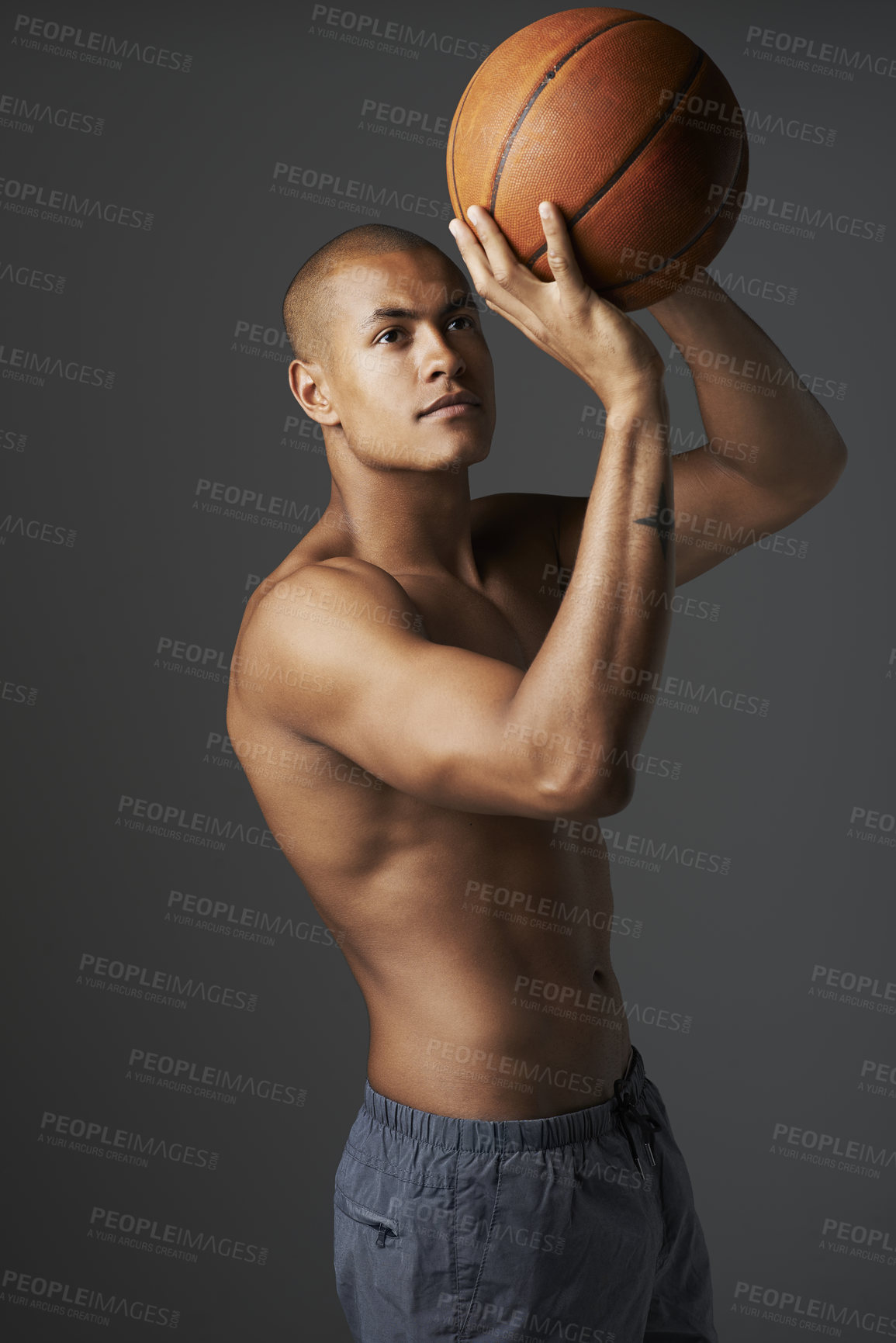 Buy stock photo Sports, basketball and sexy with man in studio for fitness, health and body. Training, workout and exercise with male athlete and ball on black background for power, performance and competition