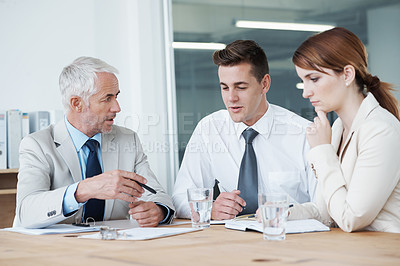 Buy stock photo Meeting, planning or training with manager and team in boardroom of office for coaching seminar. Collaboration, strategy or upskill development with business man teaching employee group at workplace