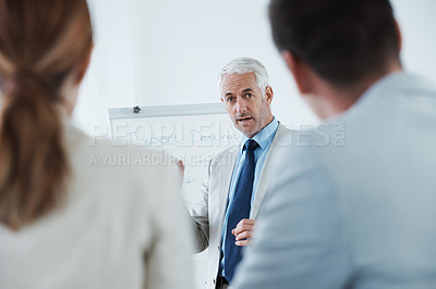 Buy stock photo Mature, man and meeting with training in presentation for business, coaching and mentor with advice. People, learning and speaker in seminar for teaching team, strategy and businessman explain plan