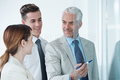 Buy stock photo Glass wall, accountant or business people with planning, conversation or brainstorming with a project. Solution, group or manager with employees or teaching with ideas or cooperation with partnership