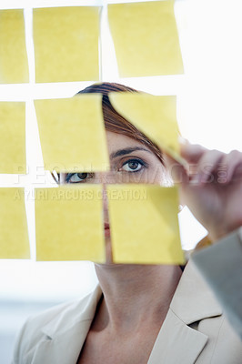 Buy stock photo Businesswoman, sticky notes and glass wall for ideas, planning and vision for logistics and schedule. Employee, brainstorming and management for meeting, goal and seo with decisions for marketing