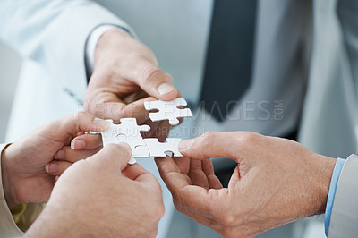Buy stock photo Business people, puzzle and hands for teamwork, synergy and problem solving in corporation. Professional colleagues, jigsaw and collaboration with strategy for partnership, support and development