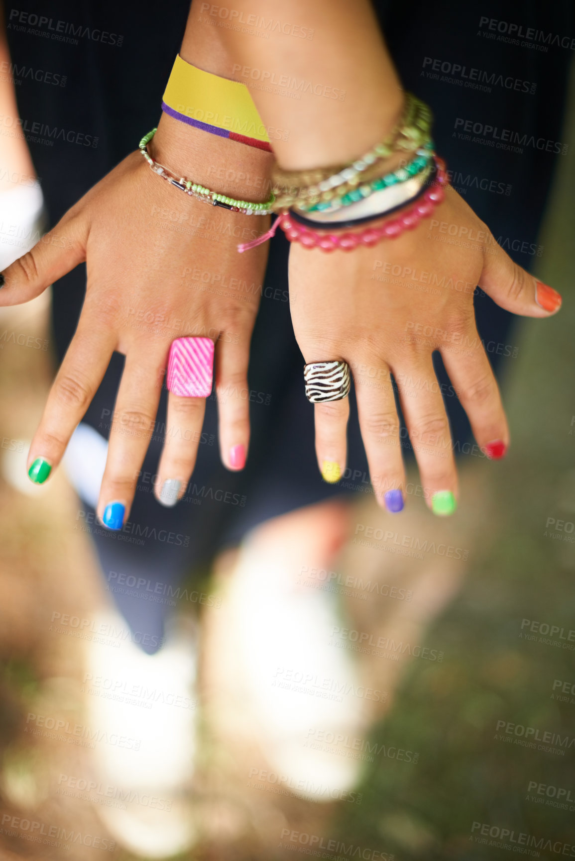 Buy stock photo Closeup, hands and woman with nail polish, outdoor and sunshine with weekend break and bracelets. Person, festival and creativity with a girl and rings with artistic expression and party with event