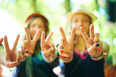 Buy stock photo Friends, hands and women with peace sign outdoor at music festival, celebration or event. Closeup, girls and v gesture together for victory, success or emoji symbol for winning at party in nature