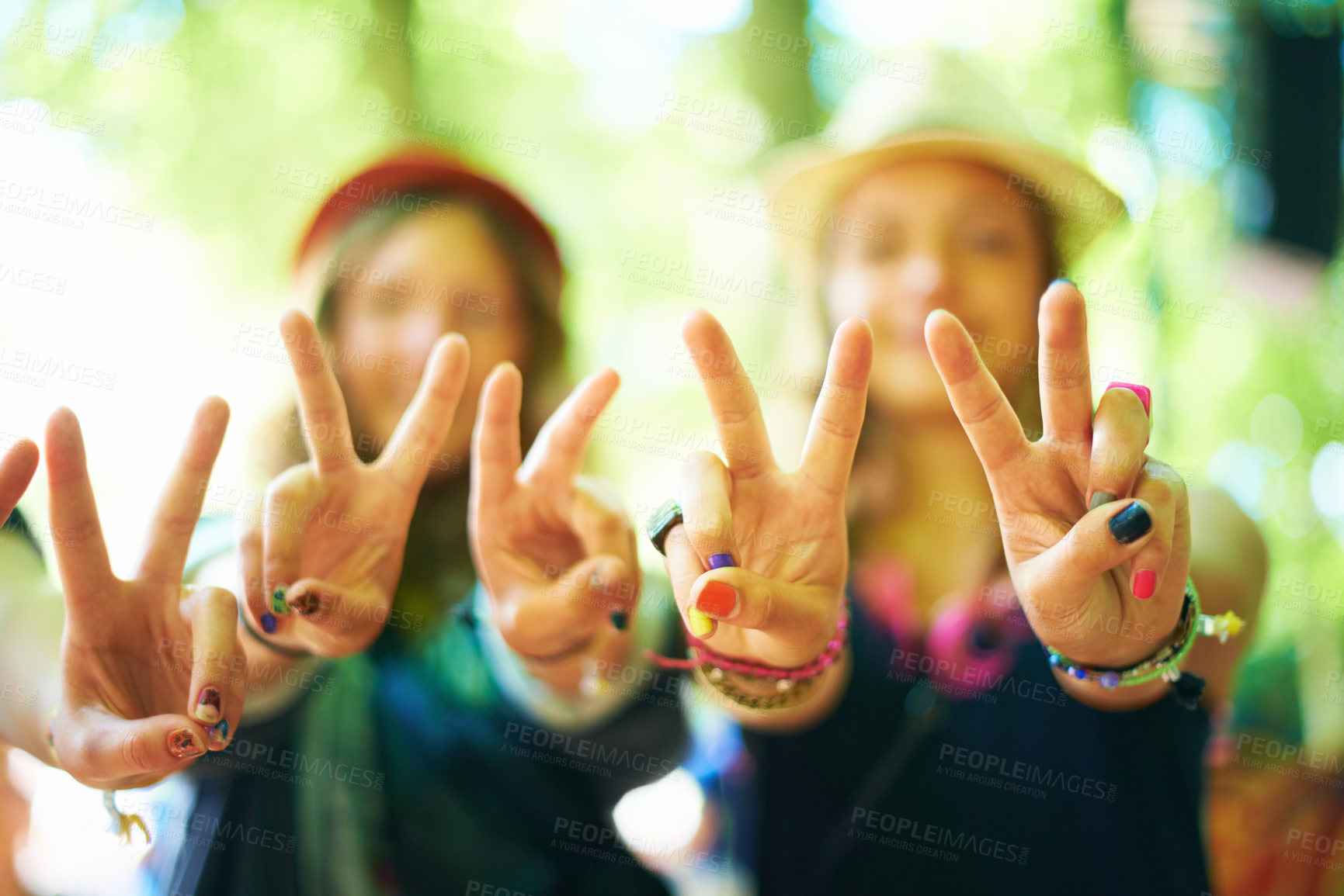 Buy stock photo Friends, hands and women with peace sign outdoor at music festival, celebration or event. Closeup, girls and v gesture together for victory, success or emoji symbol for winning at party in nature