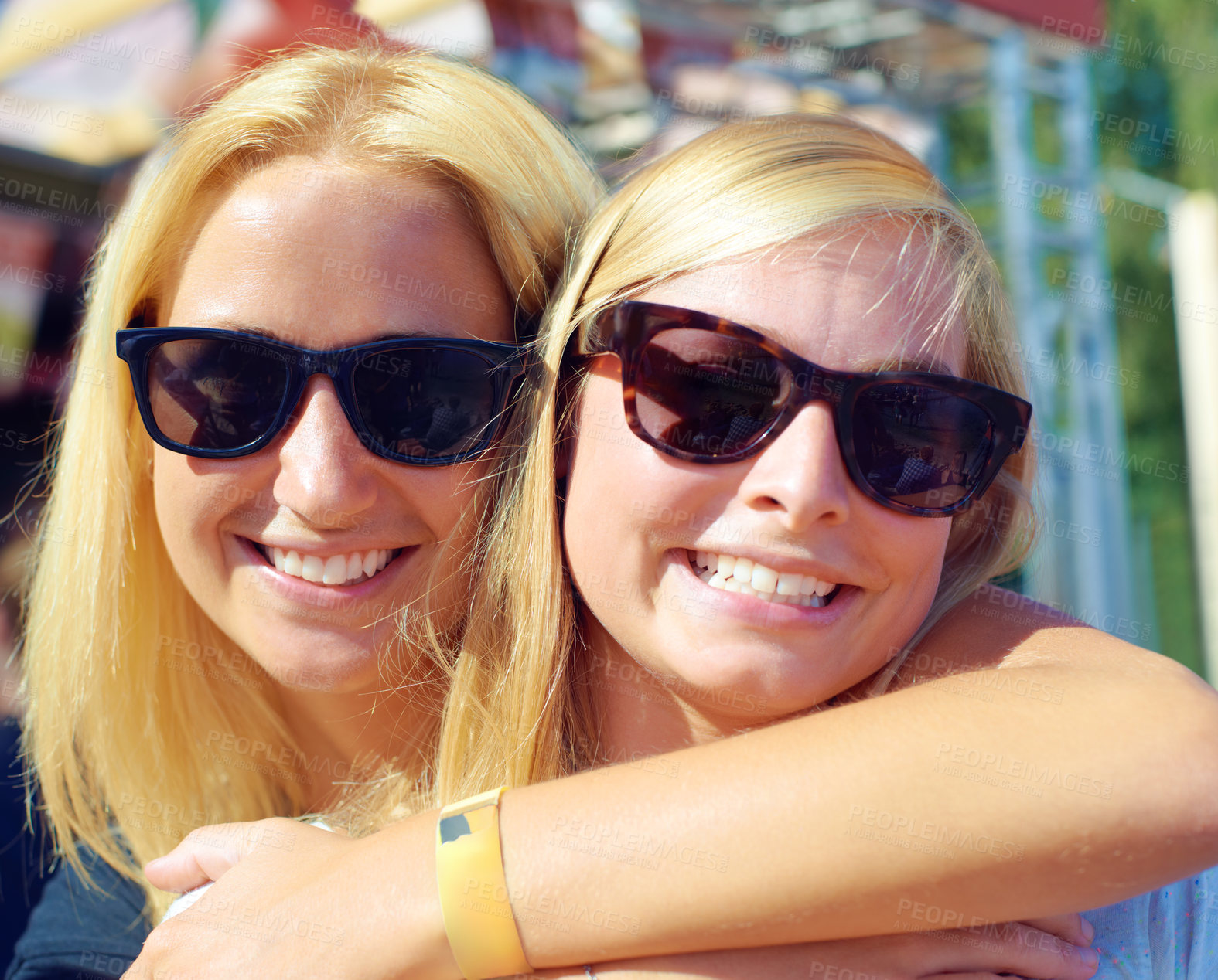 Buy stock photo Portrait, concert and women with sunglasses, hug and smile with happiness or music festival. Face, people or outdoor with friends or eyewear with weekend break or excited with embrace with summer fun