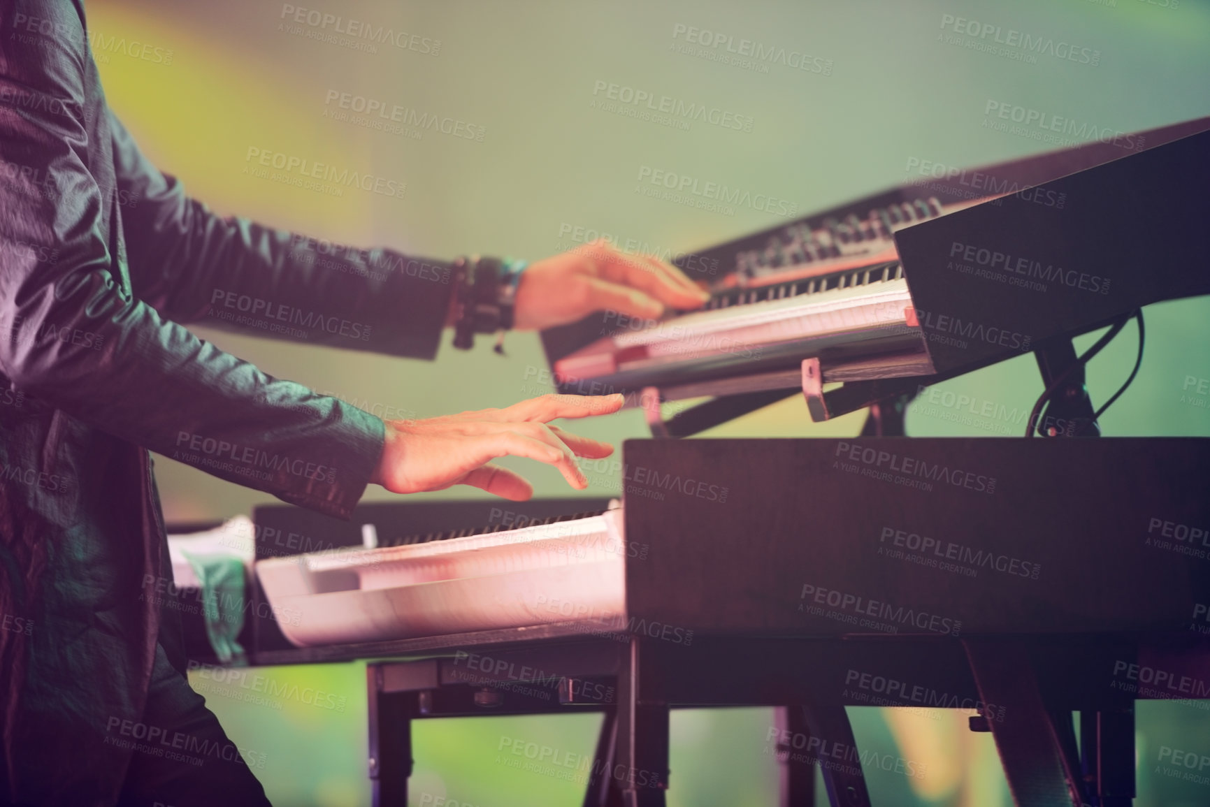 Buy stock photo Musician, keyboard synthesizer and hands at stage playing at concert, music festival or live event in Amsterdam. Artist, performance and amplifier at outdoor party for fun, enjoyment and celebration