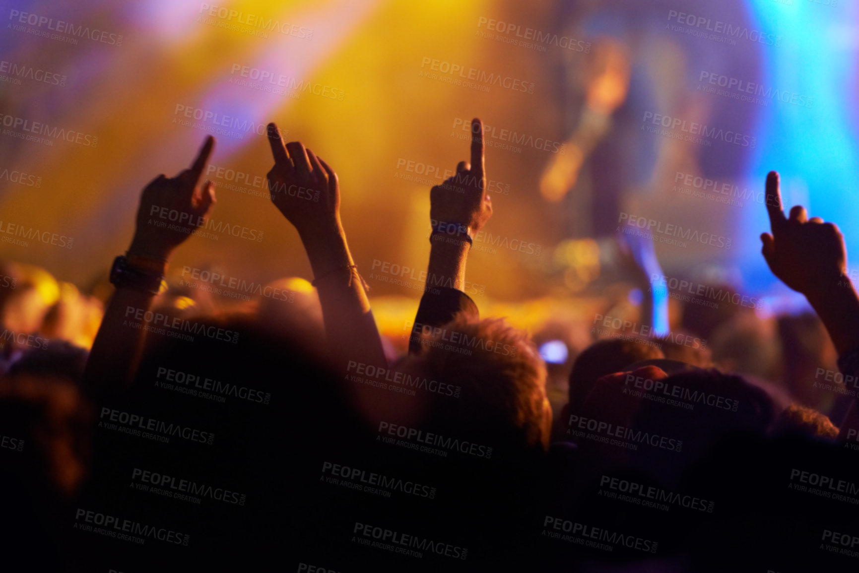 Buy stock photo Hands, crowd and silhouette at music festival with party for rock dancing at concert with stage lights, nightclub or dj. People, dance floor and holiday event in summer for entertainment, dark or fun