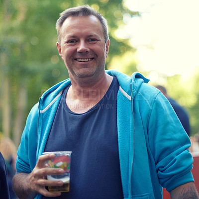 Buy stock photo Portrait, beer and man at outdoor party, celebration or happy adventure at holiday event in Germany. Smile, drinks and nature, mature person on vacation to relax with alcohol at Munich festival.