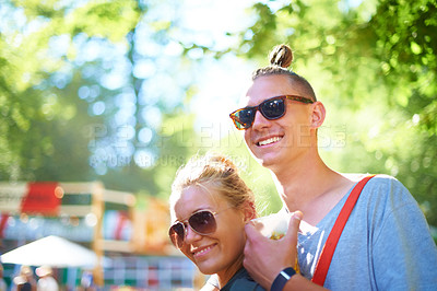 Buy stock photo Sunglasses, smile and couple at music festival outdoor, event and celebration on valentines day together in summer. Face, man and happy woman at party, carnival and date in nature with drink at park