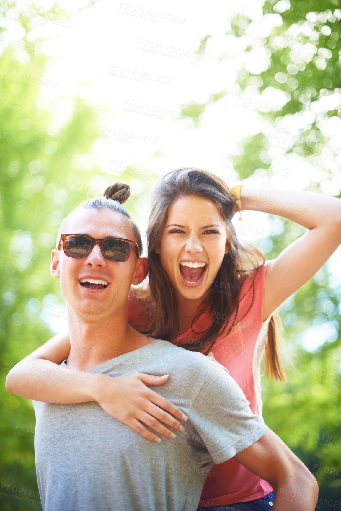 Buy stock photo Portrait, piggyback and happy couple in a park with fun, freedom and celebration outdoor. Energy, love or face of excited people in forest for weekend, holiday or vacation, bonding in nature together