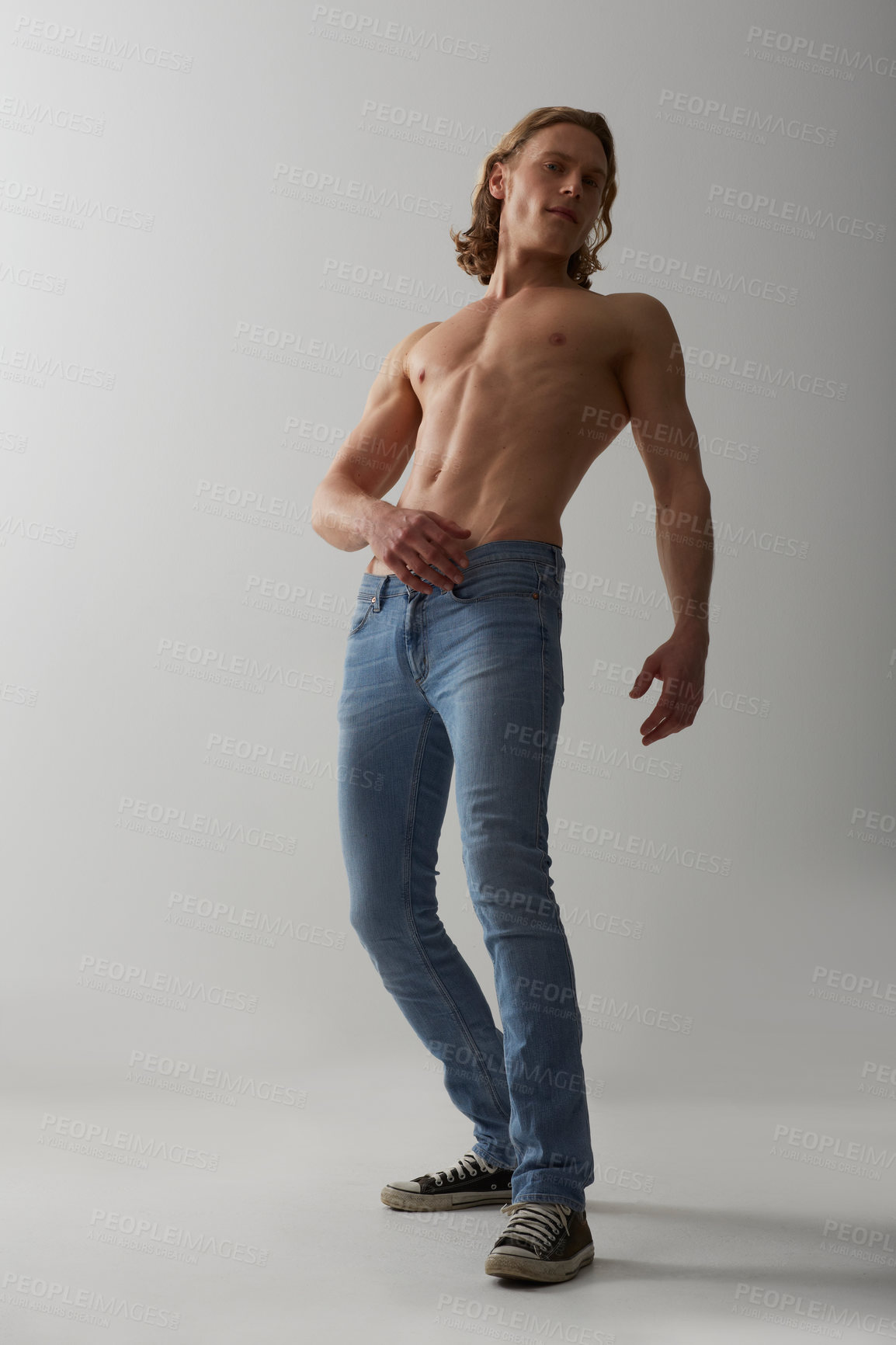 Buy stock photo Studio shot of a young man with a bare chest