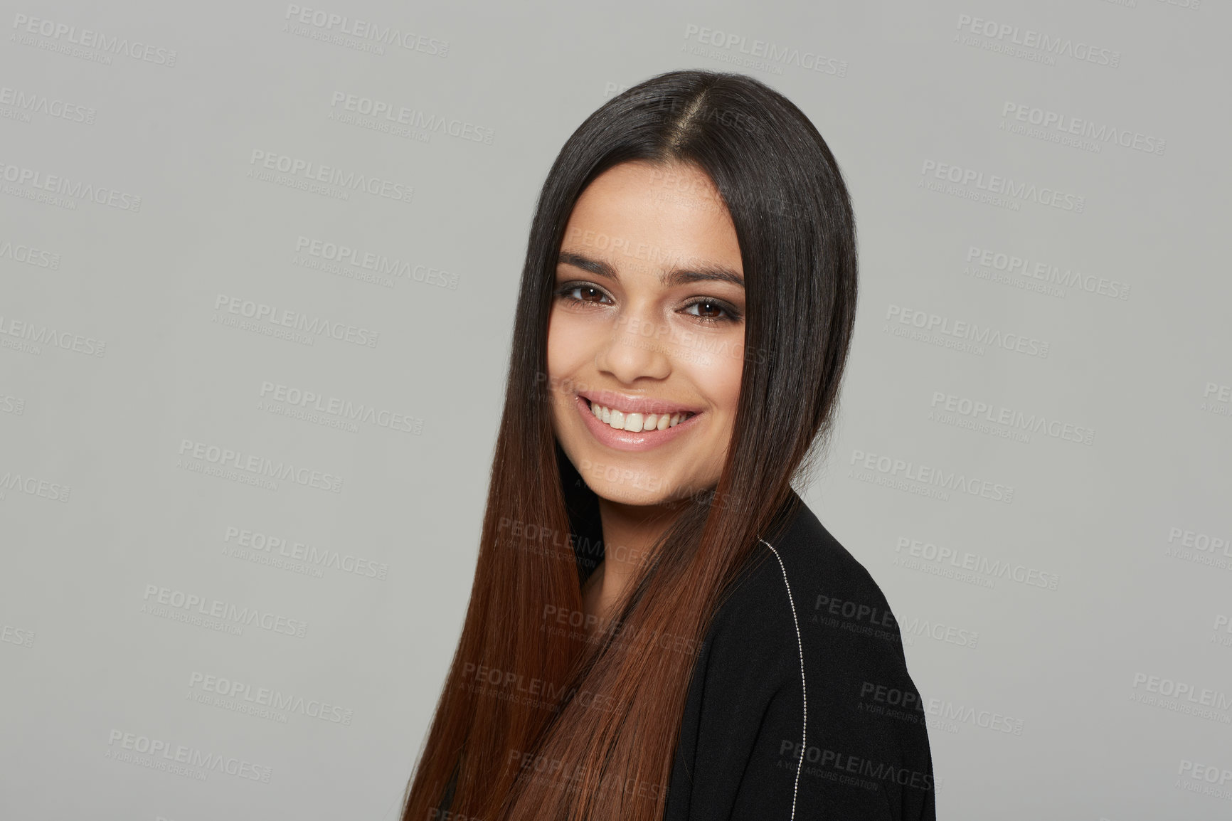 Buy stock photo Studio shot of a young brunette woman