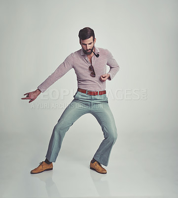 Buy stock photo Studio shot of a man in 70's style clothing