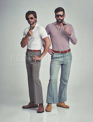 Buy stock photo Vintage, men and sunglasses or pipe in studio with fashion model, hipster outfit or confidence with calm expression. Friends, people and attitude with 70s style or retro clothes with white background