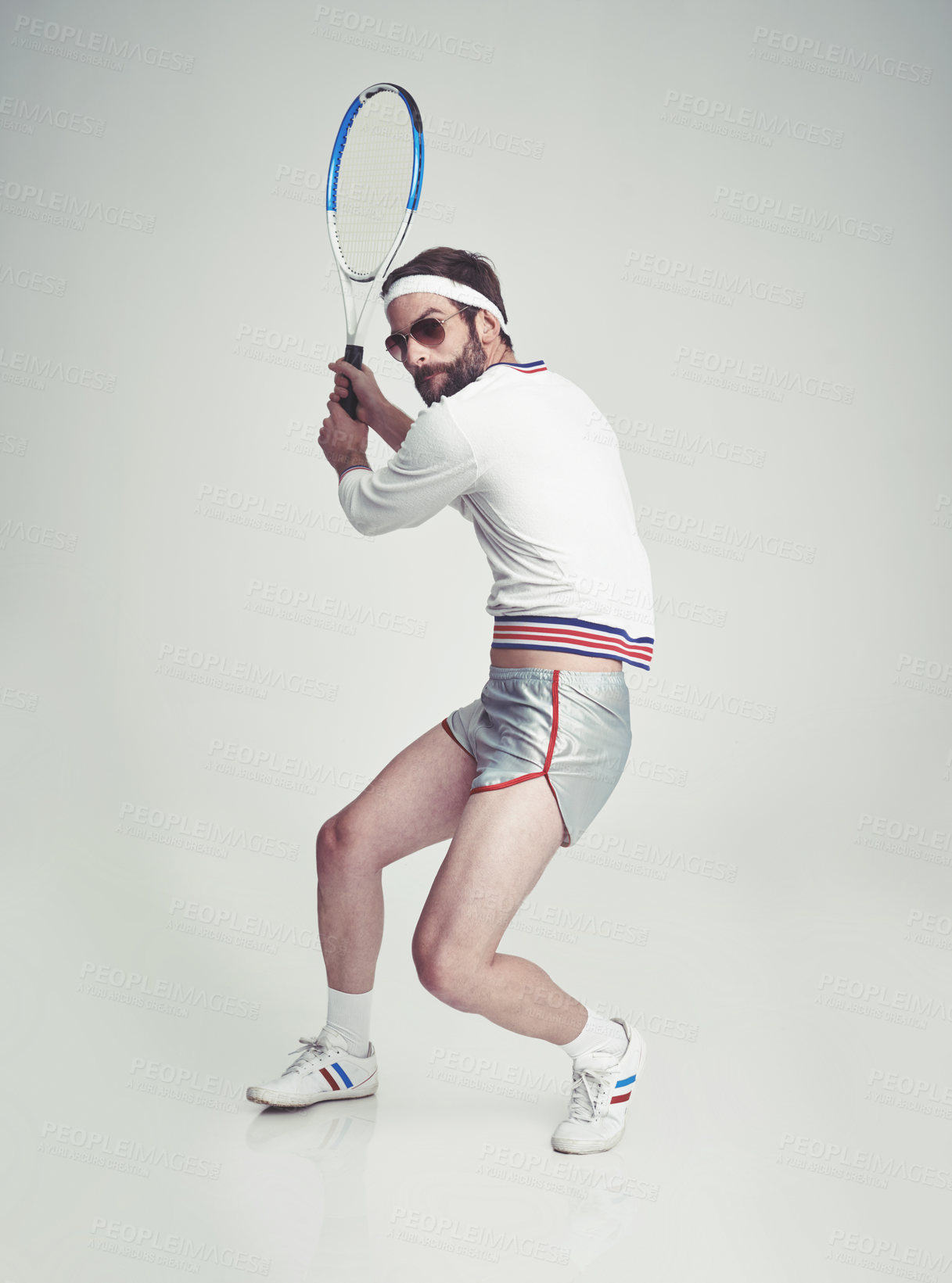 Buy stock photo A young man in the studio wearing tennis gear