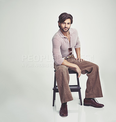 Buy stock photo Man, vintage and clothes for fashion, studio and handsome with retro aesthetic, handsome and portrait. Male person, chair and backdrop or background and model with sunglasses, luxury and funky