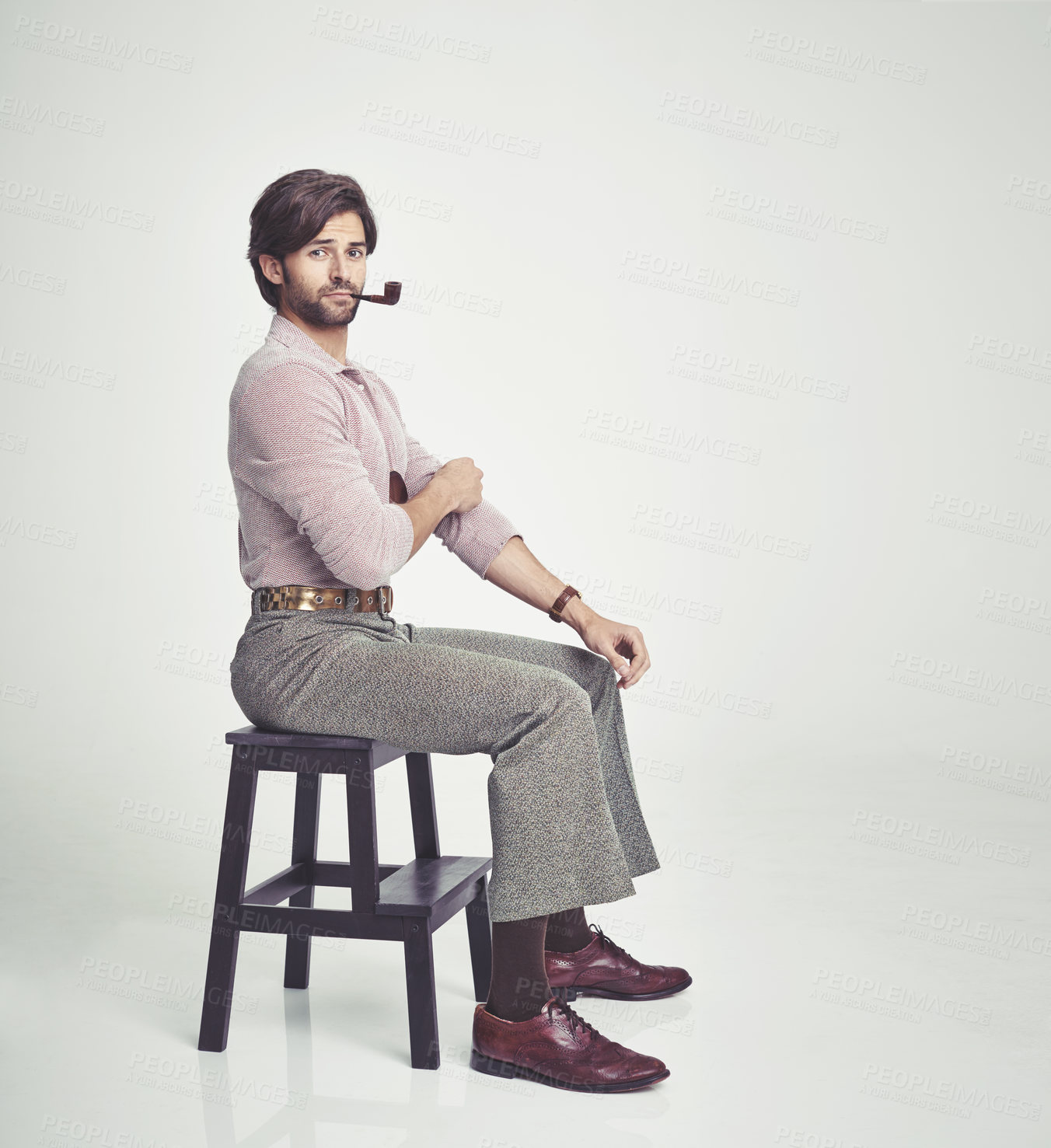 Buy stock photo A young man dressed in 70s style clothing - isolated