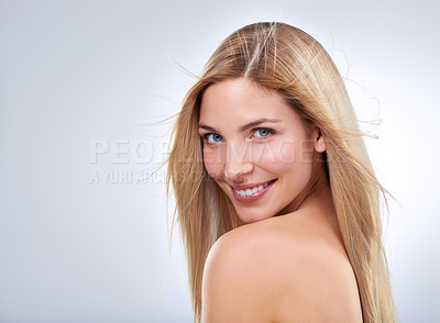 Buy stock photo Studio portrait of a young woman with long blonde hair