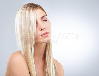 Buy stock photo Straight hair, beauty and woman with eyes closed in makeup isolated on a white studio background. Face, hairstyle or blonde model in cosmetics, hairdresser or salon treatment for care on mockup space