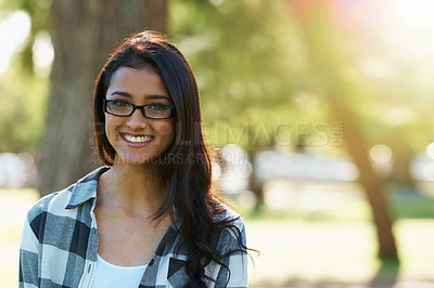 Buy stock photo Nature, eyewear and woman happy in portrait, smiling and relaxed on vacation in Dubai for peace. Female person, glasses and enjoyment on holiday in outdoors, adventure and travel to countryside