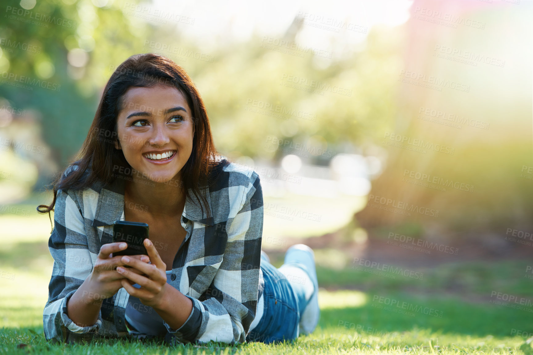 Buy stock photo Grass, phone or happy woman in nature thinking of social media to chat on internet post or website notification. Park, smile or female person on mobile app for texting, networking or typing to relax