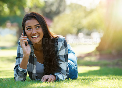 Buy stock photo Phone call, relax and woman in a park, sunshine and happiness with conversation and network. Person, outdoor and girl with a smartphone or summer with weekend break and cheerful with a contact or app