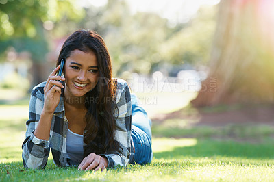 Buy stock photo Phone call, relax and woman in a park, summer and happiness with conversation and nature. Person, outdoor and girl with a smartphone or sunshine with weekend break or cheerful with a contact or peace