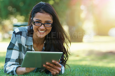 Buy stock photo College, woman and portrait with tablet in park for research, project or learning outdoor on campus. University, student and girl streaming online with ebook, education or studying on grass in garden