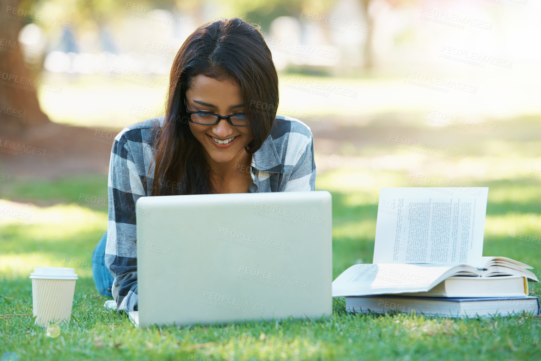 Buy stock photo Laptop, lawn or happy woman in park with books for learning knowledge, information or education. Smile, textbook or female student on grass for studying history or typing online on college campus