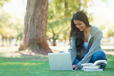 Buy stock photo Laptop, lawn or happy woman in nature with books for learning knowledge, information or education. Smile, textbook or female student in park on grass for studying or typing online on college campus 