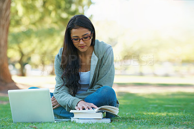 Buy stock photo Laptop, lawn or woman in nature reading books for learning knowledge, information or education. Research, textbook or female student in park on grass for studying or typing online on college campus 