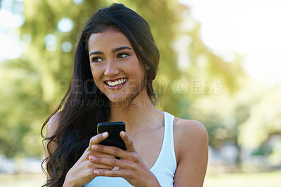 Buy stock photo Happy, thinking and woman outdoor with phone to post on social media for communication. Virtual, chat and college student in woods with smartphone for networking, connection and contact in park