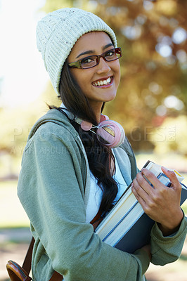Buy stock photo Portrait, smile and books for education with student outdoor on campus for learning, growth or development. Face, study and scholarship with woman at college, school or university for knowledge
