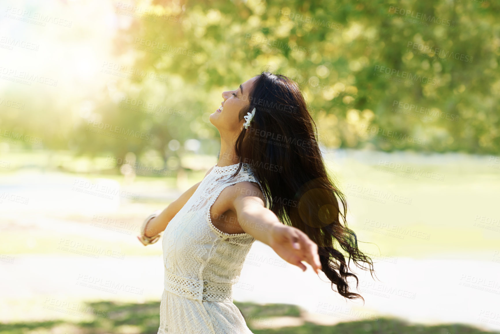 Buy stock photo Nature, freedom and woman dancing in outdoors, smiling and relaxed on vacation in garden for peace. Happy female person, fun and enjoyment on holiday in forest, adventure and travel to countryside