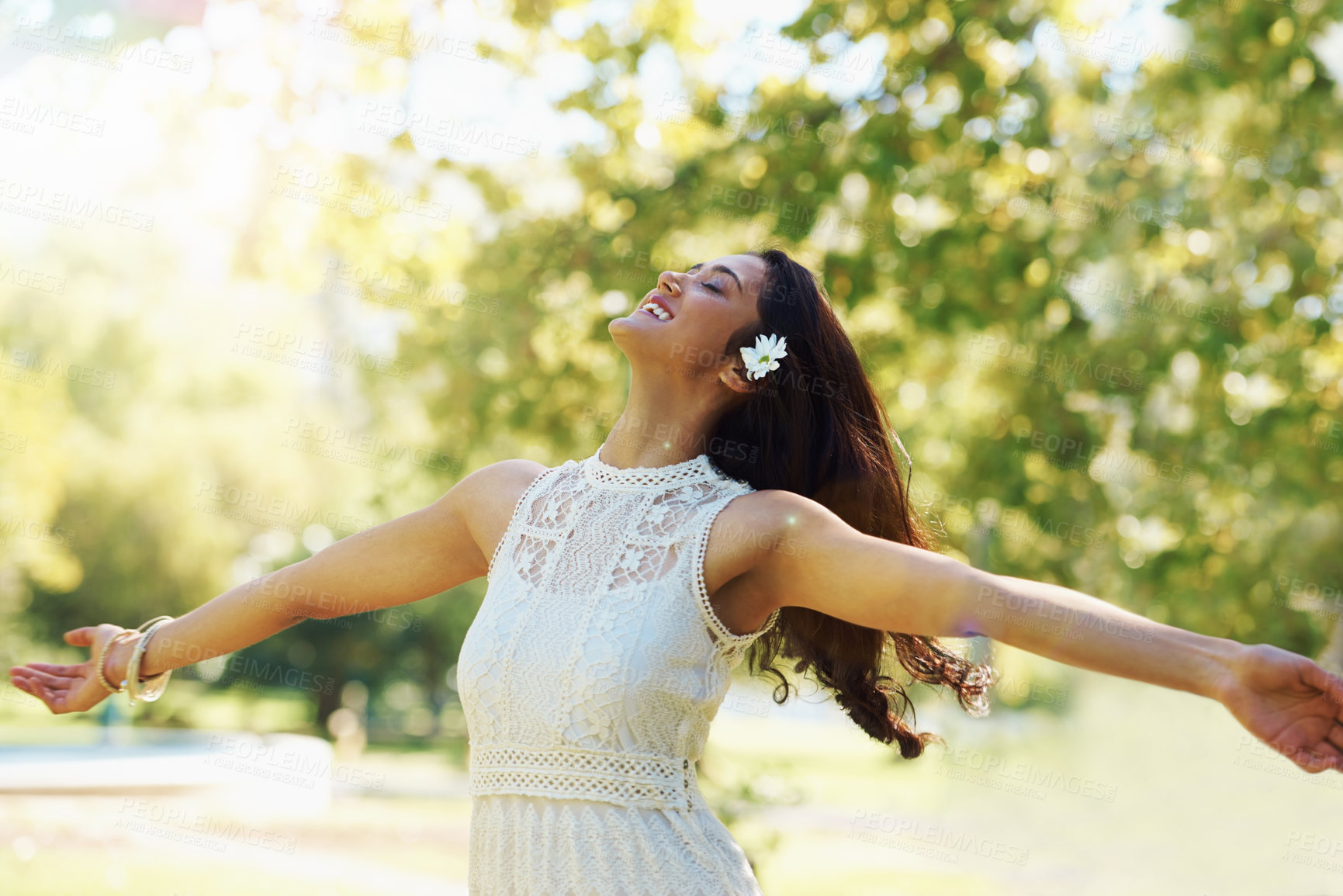 Buy stock photo Nature, freedom and woman dancing in park, smiling and relaxed on vacation in garden for peace. Happy female person, fun and enjoyment on holiday in outdoors, adventure and travel to countryside