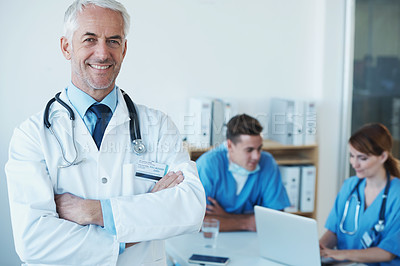 Buy stock photo A group of healthcare workers standing and smiling at the camera