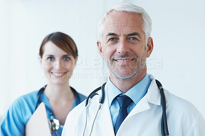 Buy stock photo Smile, portrait and doctor with nurse in hospital with clipboard for medical research in collaboration. Happy, checklist and senior male surgeon with healthcare worker in clinic for teamwork.