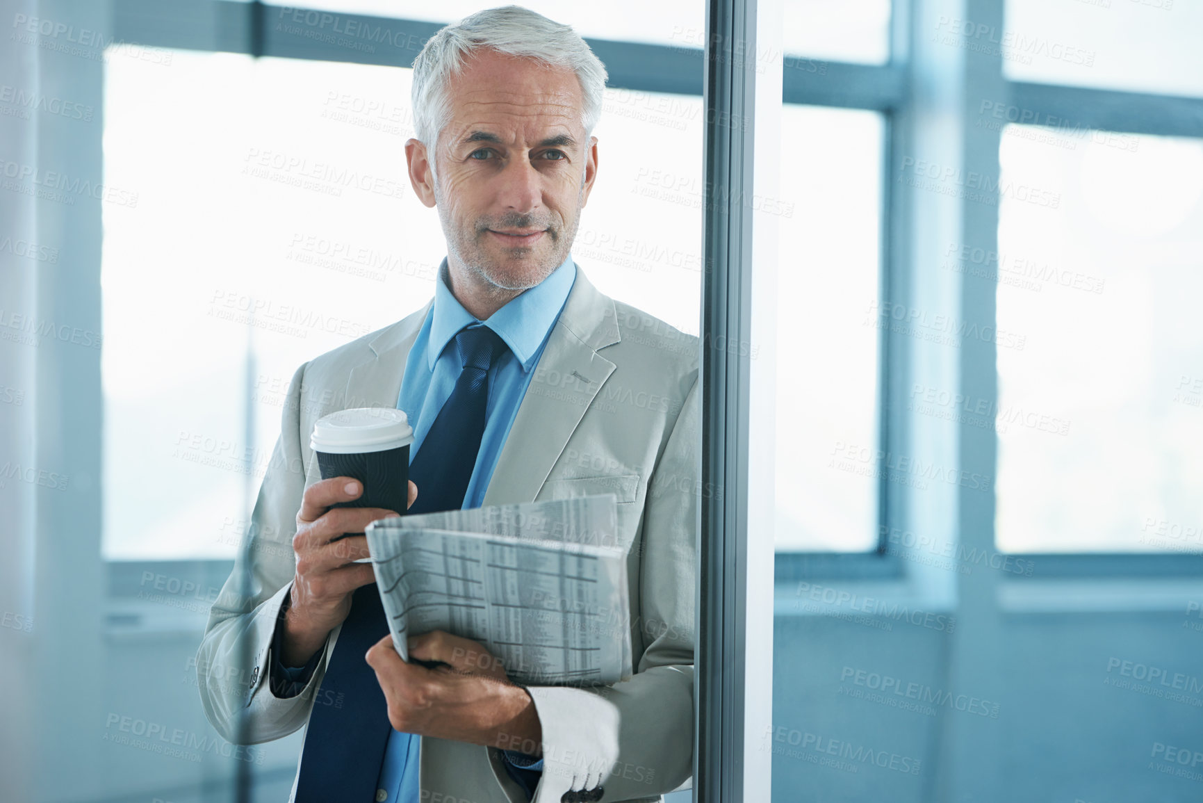 Buy stock photo Portrait of a mature businessman drinking a  coffee and a newspaper