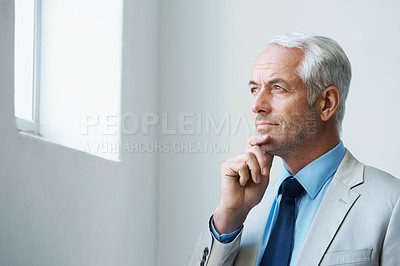 Buy stock photo Thinking, mature and businessman at office in suit, looking at window and confident with thoughts. Corporate, executive and professional with experience in business with wisdom and ideas for future