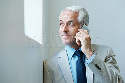 Buy stock photo Corporate, mature man and busy in phone call with suit, formal look and vision for work at office. Entrepreneur, executive and professional with experience, wisdom and career expert with advice 