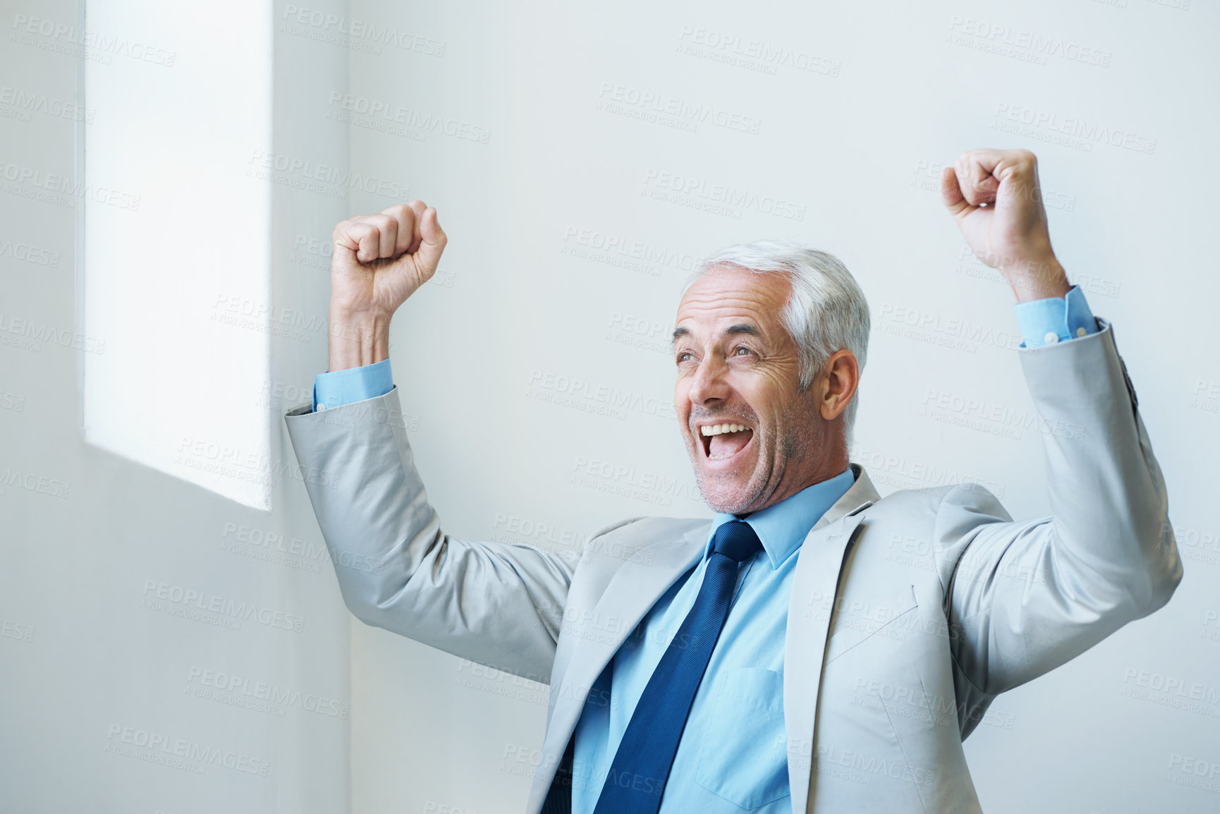 Buy stock photo Mature, businessman and celebration for corporate achievement for loan approval, good news or feedback. Male person, arms up and happy boss at law office for victory, announcement or professional