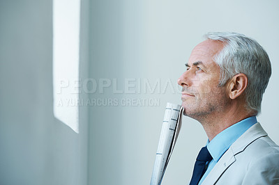 Buy stock photo Mature, businessman and thinking with newspaper for information as accountant for world review, stock market or economy. Male person, thoughts and article in Canada or finance, planning or investment